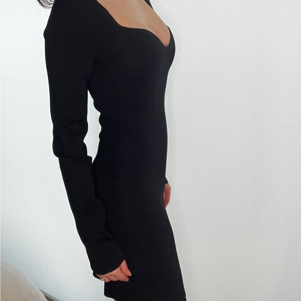 Nanushka Marina black compact viscose knit. Size small.